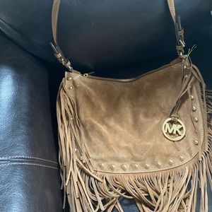 Like new Michael Kors satchel with fringe